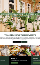 Ein einladendes Café mit grünen Pflanzen, hellen Wänden und einem gemütlichen Ambiente für Kaffeeliebhaber.